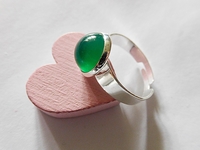 Silberfarbener Ring mit 10 mm Onyx Achat Cabochon in grn